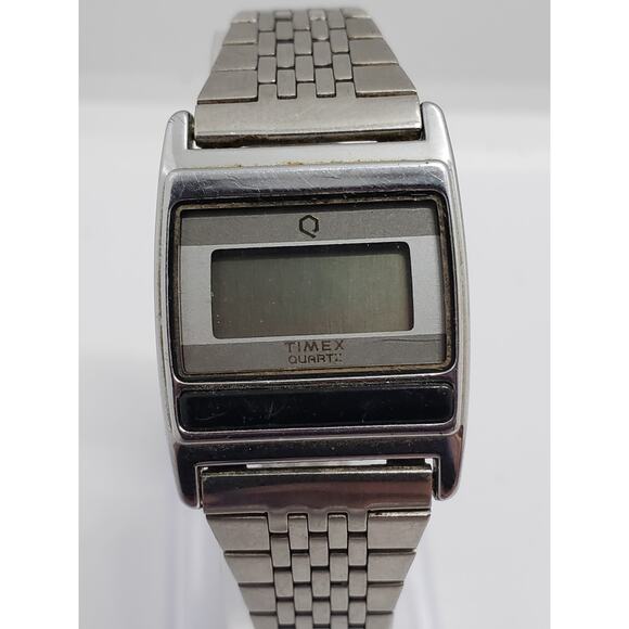 Digital Men's Timex watch. Large square face. Stainless steel back.
